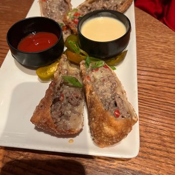 Redstone American Grill - Cheesesteak Egg Roll - Steakhouses Near Me - Oakbrook Terrace, Illinois Redstone American Grill - Cheesesteak Egg Roll - Steakhouses Near Me - Oakbrook Terrace, Illinois