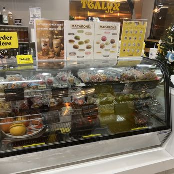 Tealux Cafe - a display case with a variety of pastries - Bubble Tea Near Me - Ballwin, Missouri
