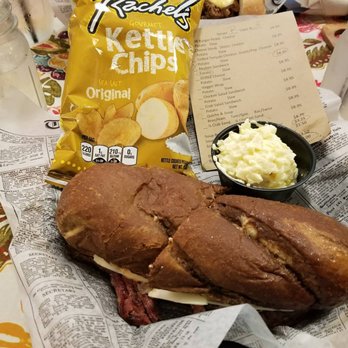 Wild Carrot - Corned beef Rueben sandwich with potato salad and a bag of kettle chips - Cafes Near Me - Waverly, Iowa