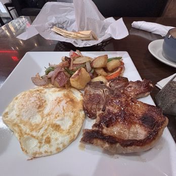 Rinconcito Latino Mixto - Pork chop and eggs breakfast plate. - Latin American Near Me - Miami, Florida Rinconcito Latino Mixto - Pork chop and eggs breakfast plate. - Latin American Near Me - Miami, Florida