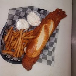 Monico's Bar & Grill - This was the fish sandwich I just got.... Damn was it good
