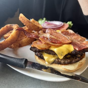 CJ's Corner - Double bacon cheeseburger and onion rings. Not too bad until you realize the onion rings were burned. - American Near Me - Shelton, Washington CJ's Corner - Double bacon cheeseburger and onion rings. Not too bad until you realize the onion rings were burned. - American Near Me - Shelton, Washington