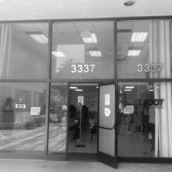 LADOT Parking Violations Bureau - Mid-City - NO sign indicating that if you so much as step outside the door, you will "have to take a new number & wait again"