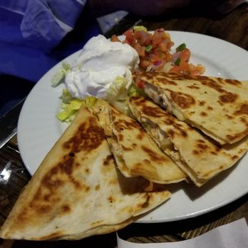 Blue Iguana - Generous portion of Chicken quesadillas stuffed lots of chicken and cheese...also on the  happy hour menu for $5.... - New American Near Me - Fairfax, Virginia