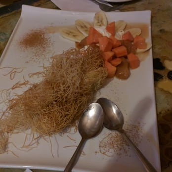 Mombar - Angel hair pasta like desert with fresh fruit and honey.   Cook surprised us! - Egyptian Near Me - Astoria, New York