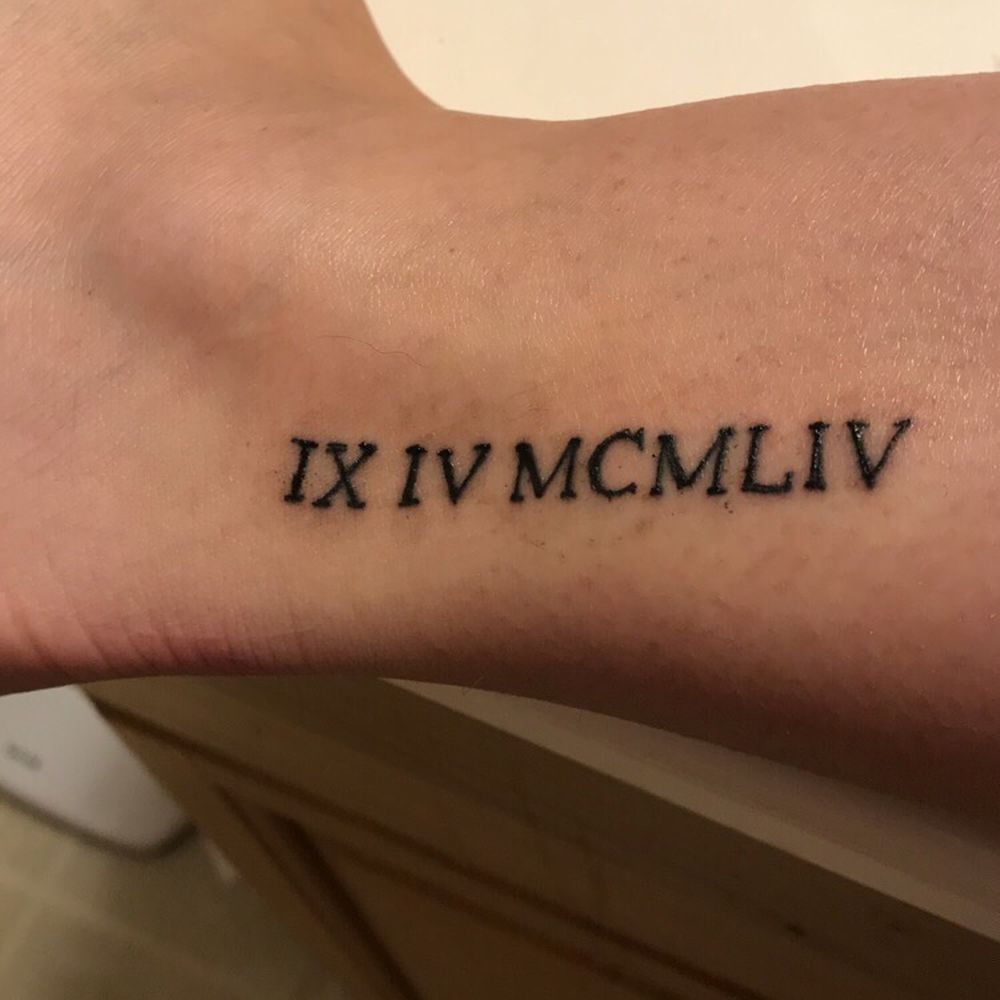 Roman Numerals on ankle Roman Numerals on ankle