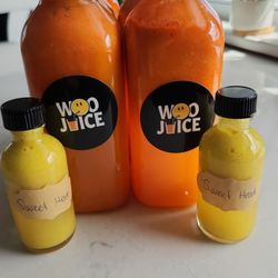 Woo Juice - Airport Hill Sunrise and Sweet Heat wellness shots.