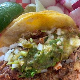 a close up of a taco a close up of a taco