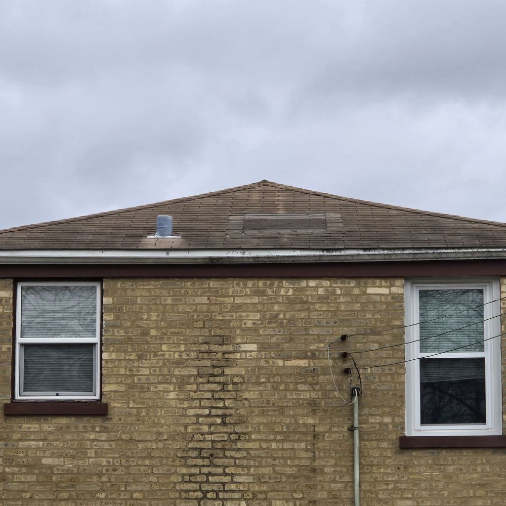 Roman Roofing - Before: back of house and bald spot - Roofing Near Me Roman Roofing - Before: back of house and bald spot - Roofing Near Me