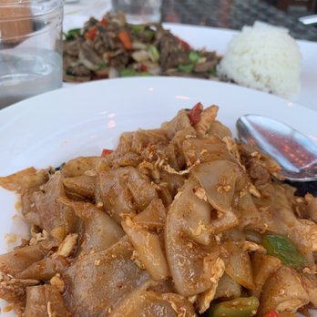Nur Thai - Drunken Noodle w/ Chicken + Spicy Basil Duck with jasmine rice - Thai Near Me - Park, New York Nur Thai - Drunken Noodle w/ Chicken + Spicy Basil Duck with jasmine rice - Thai Near Me - Park, New York