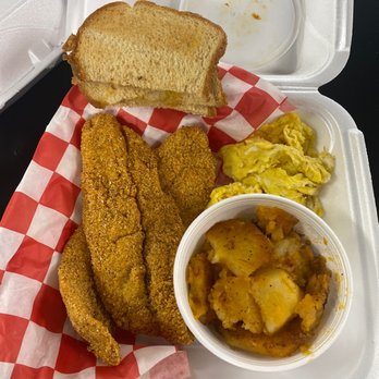 The Grub House - Fried Catfish breakfast with eggs, potatoes and onions, with wheat toast. - Breakfast & Brunch Near Me - Indianapolis, Indiana The Grub House - Fried Catfish breakfast with eggs, potatoes and onions, with wheat toast. - Breakfast & Brunch Near Me - Indianapolis, Indiana