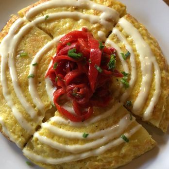 Chloe - Tortilla espanola - basically egg and potato crepe with pickles! - New American Near Me - Washington, DC, District of Columbia