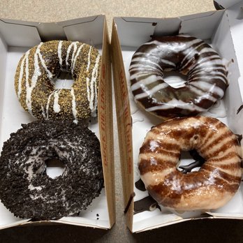Duck Donuts - One the left top, s'mores, and Oreo on the bottom. Right top The Flip-Flop and Peanut Butter Paradise on the bottom - Donuts Near Me - Highpoint, North Carolina