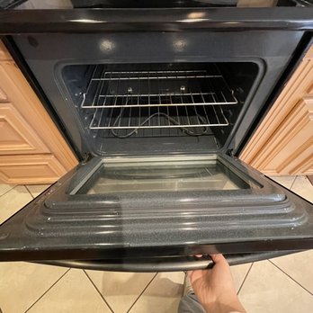 Esteban's House Cleaning - Shiny oven after cleaning - Home Cleaning Near Me
