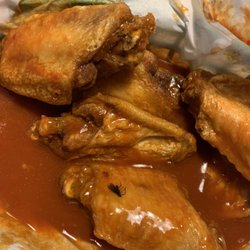 Beef 'O' Brady's - Buffalo wings with a dead fly cooked on.