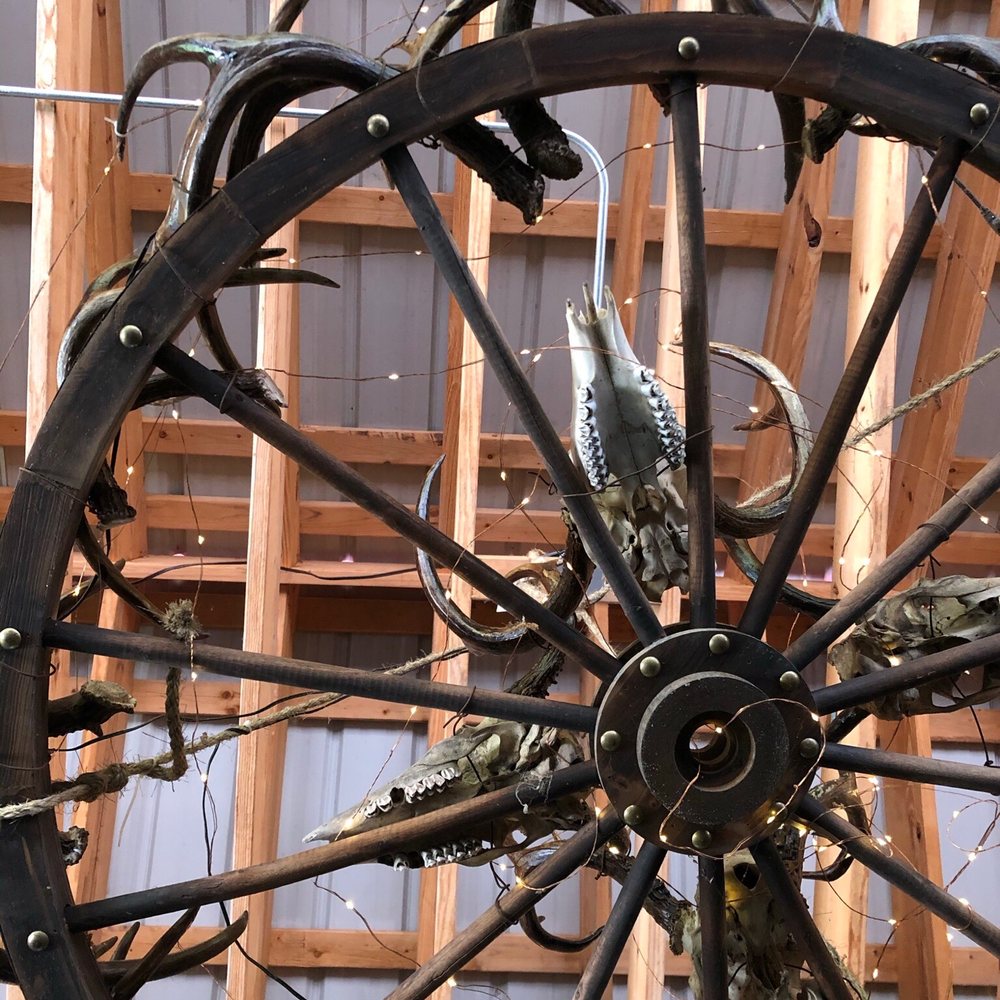 Jake's Place - Wooden wheel chandelier overhead. You can see the teeth in these animal skulls! - Southern Near Me - Ashland, Virginia Jake's Place - Wooden wheel chandelier overhead. You can see the teeth in these animal skulls! - Southern Near Me - Ashland, Virginia