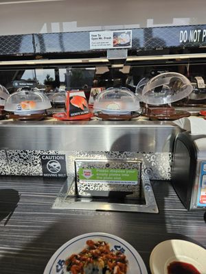 Kura Revolving Sushi Bar by null