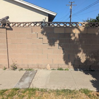 P. A. Construction - Before. Cinder block wall cracking and crumbling. - Masonry/Concrete Near Me - Santa Ana, California
