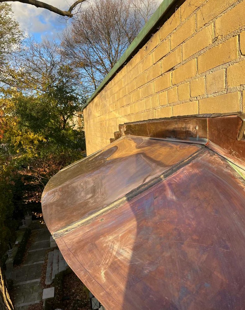 Slide of Lummus Park Roofing