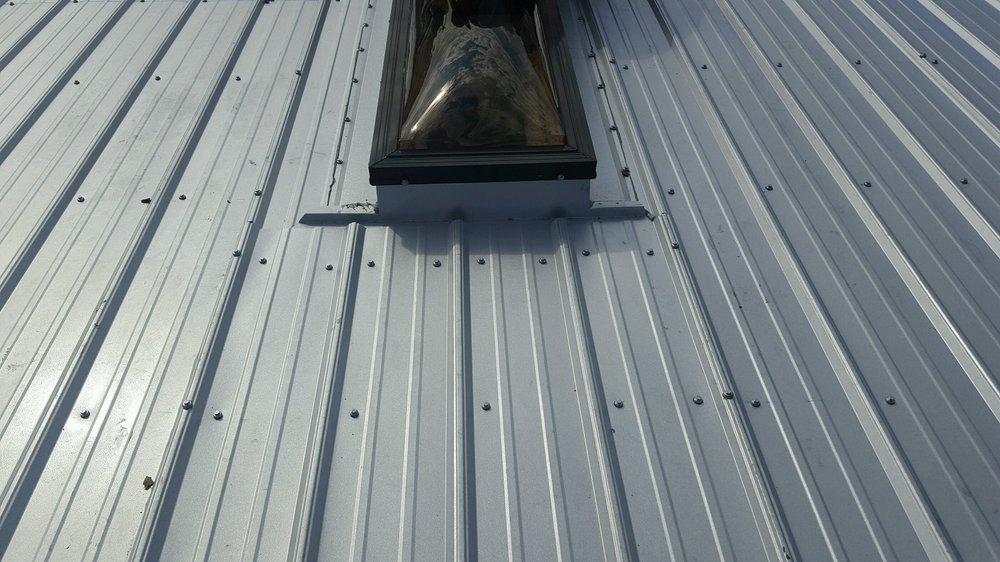 Slide of Luviano Roofing