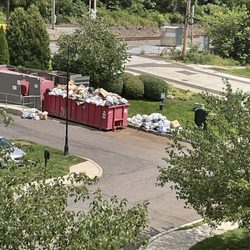 The Pointe at River Glen - Overflowing dumpsters!