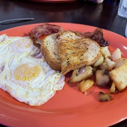 Riverside Cafe - Eggs, wheat toast bacon, potatoes.