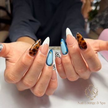 Nail Lounge and Spa - Ready to mix it up this season?  
From bold animal prints and tortoise shell textures to sleek denim blues, our artistry knows no bound - Day Spas Near Me - Hurst, Texas