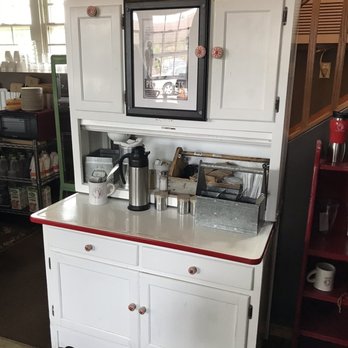 Fat Cat Coffee Works - Drink condiment hutch - Coffee & Tea Near Me - New Glarus, Wisconsin
