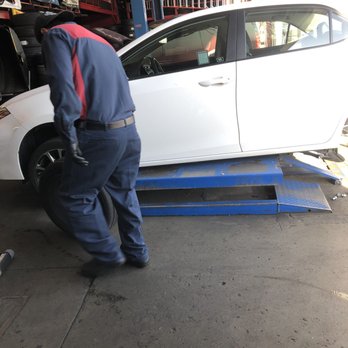 Rolling Tires and Wheels - The service worker attending to my car - Tires Near Me - San Pedro, California Rolling Tires and Wheels - The service worker attending to my car - Tires Near Me - San Pedro, California