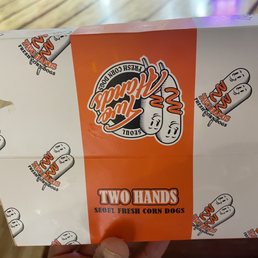 two hands holding a box two hands holding a box
