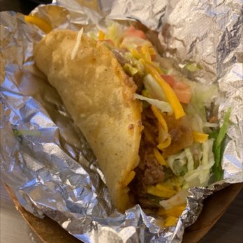 Ray's Drive Inn - A beef puffy taco. Took it to hotel caused I'm stuffed! - Tex-Mex Near Me - San Antonio, Texas