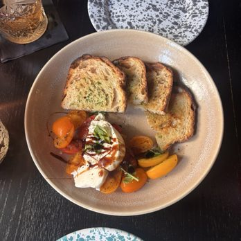 Inman Social - Sourdough and tomato burrata - Italian Near Me - Cleveland, Tennessee Inman Social - Sourdough and tomato burrata - Italian Near Me - Cleveland, Tennessee