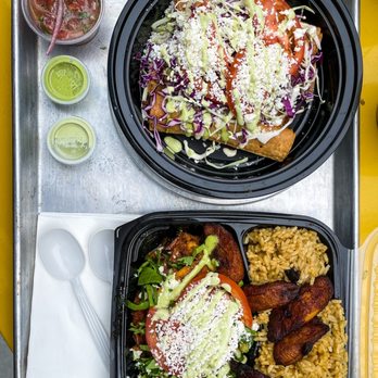 Omarcitos Latin Cafe - two trays of food - Latin American Near Me - Chicago, Illinois Omarcitos Latin Cafe - two trays of food - Latin American Near Me - Chicago, Illinois