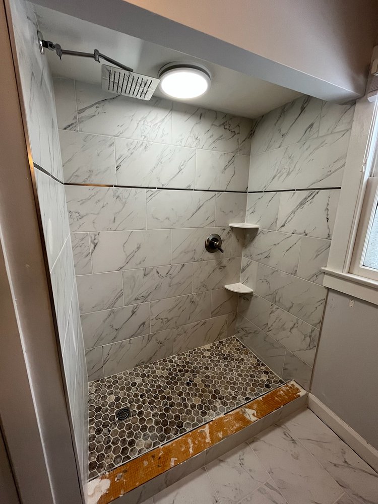 Slide of Home Experts Indy