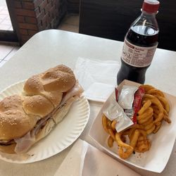 Toasted Turkey Sub, and crispy curly fries.
