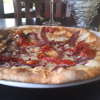 aMano Restaurant - Smoked Duck, roasted tomatoes and Fontina pizza. To die for!! - Wine Bars Near Me - Mattituck, New York aMano Restaurant - Smoked Duck, roasted tomatoes and Fontina pizza. To die for!! - Wine Bars Near Me - Mattituck, New York