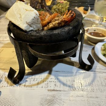 La Pizca Mexican Grill & Cantina - MOLCAJETE MIXTO Beef, chicken & shrimp with grilled cheese & veggies & salsa tatemada - Seafood Near Me - Conroe, Texas