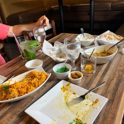 Jaxspice - Chicken Biryani, eggplant bharta, bullet and garlic naan, mint sauce, pickles, and the drinks... the jolly and a mojito.