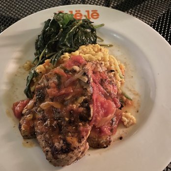 Ulele - Fire roasted chicken wit saffron rice and garlic spinach - New American Near Me - Tampa, Florida