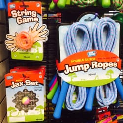 Book Nest Toy Store - Put a spring in your step! Head outside with a jumprope, jax, or even a hula hoop!