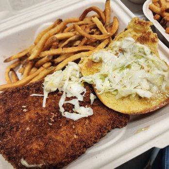 Black Star Co-op Pub & Brewery - a fried chicken sandwich with coleslaw and french fries - Breweries Near Me - Austin, Texas Black Star Co-op Pub & Brewery - a fried chicken sandwich with coleslaw and french fries - Breweries Near Me - Austin, Texas