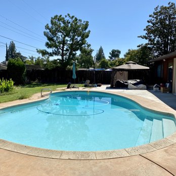 Construction Valdes - AFTER:  back yard looks bigger and feels more open now that the fence is gone! - Painters Near Me