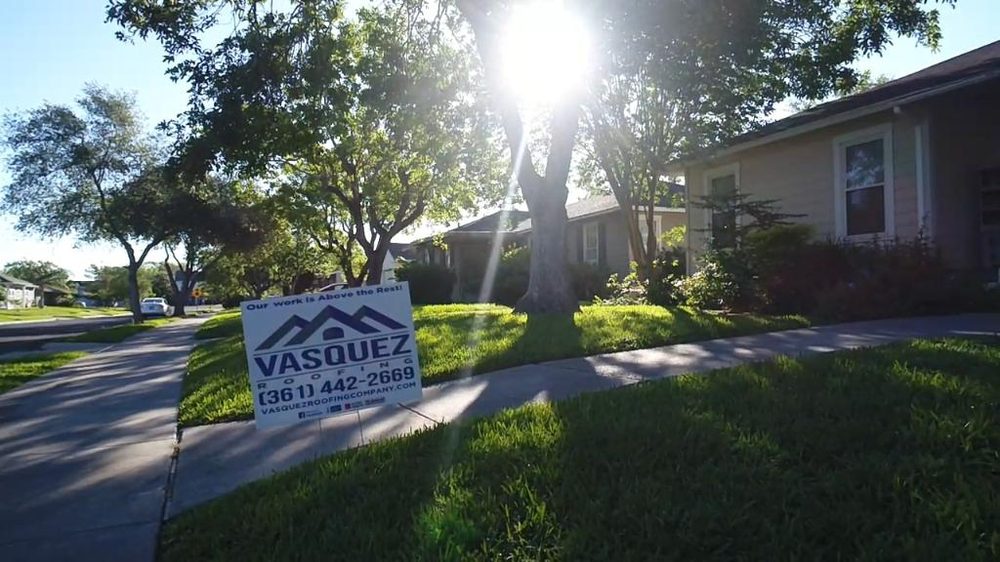 Slide of Vasquez Roofing Company
