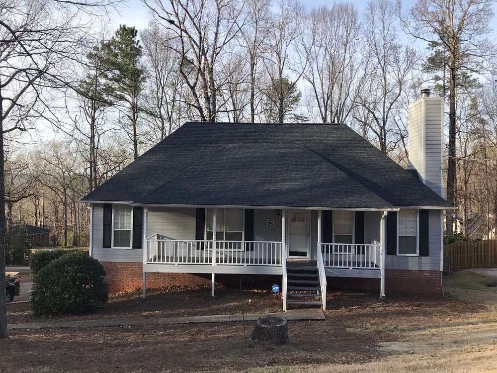 Slide of Shelby Roofing