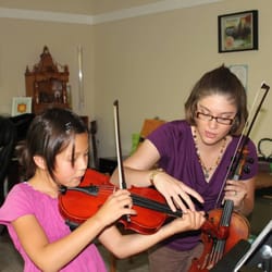 Acoustic Ventures Music Studio - P.D. learning fancy fingerings for new 'natural' notes. Photo courtesy of Rina T.