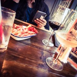 Smoke Yard - I like that they have small and large wine servings in case your not a big drinker like me ..pizza fries are interesting