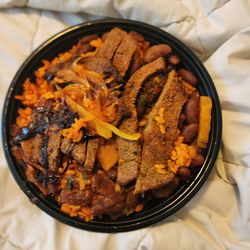 MofonGo - My Bowl The steak and rice and beans Bowl topped with grilled onions