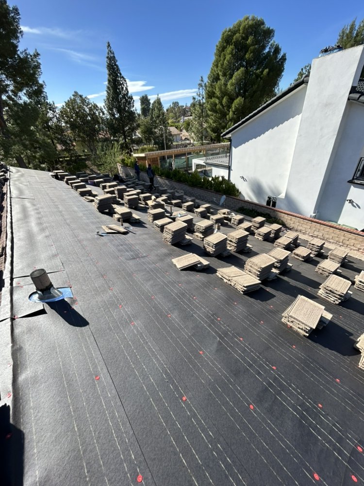 Slide of Blue J’s Roofing