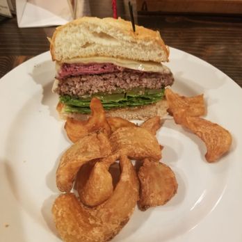 Last Stop Saloon - Our Pastrami & Swiss Burger already split when our server served it! - Bars Near Me - The Dalles, Oregon