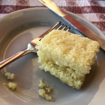 Conchy Joe's - The complimentary cornbread is a welcome lagniappe. Came out warm. Get the butter! - Seafood Near Me - Jensen Beach, Florida